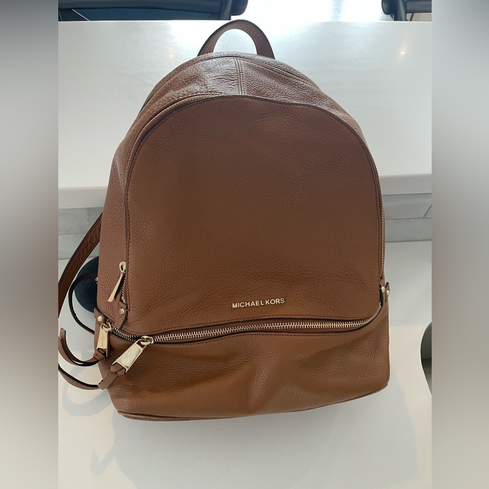 MK brown leather small backpack